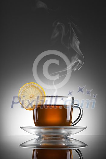 cup of hot tea with lemon and steam cup of hot tea with lemon and steam