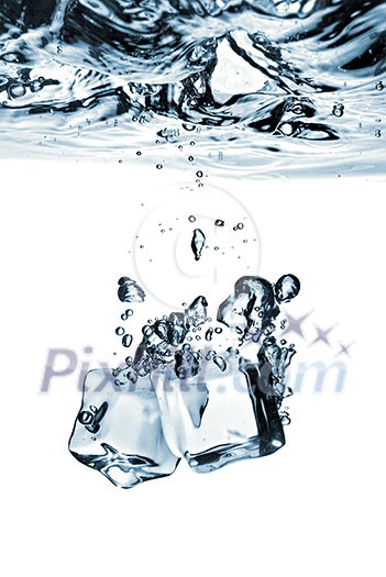 ice cubes dropped into water with splash isolated on white ice cubes dropped into water with splash isolated on white