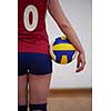 volleyball woman jump and kick ball isolated on white background