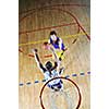 competition cencept with people who playing basketball in school gym