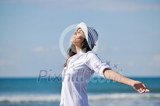 happy young woman relax onbeautiful beach at morning happy young woman relax onbeautiful beach at morning