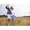 happy young couple have romantic time outdoor while smiling and hug