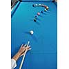 young pro billiard player finding best solution and right angle at billard or snooker pool sport  game 