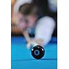 young pro billiard player finding best solution and right angle at billard or snooker pool sport  game 