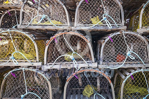 Stacks of wooden lobster traps in North Rustico, Prince Edward Island, Canada. Stacks of wooden lobster traps in North Rustico, Prince Edward Island, Canada.