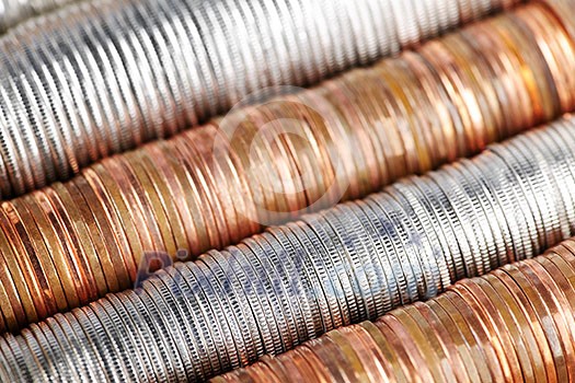 Background of penny nickel dime and quarter stacked coins Background of penny nickel dime and quarter stacked coins