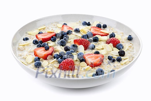 Bowl of hot oatmeal breakfast cereal with fresh berries Bowl of hot oatmeal breakfast cereal with fresh berries