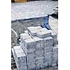 Stacks of interlocking stones for installing driveway landscaping