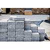 Stacks of interlocking stones for installing driveway landscaping