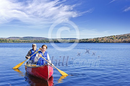 Father and daughter canoeing on Lake of Two Rivers, Ontario, Canada Father and daughter canoeing on Lake of Two Rivers, Ontario, Canada