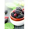 Ripe mulberry berries in a bowl, freshly picked