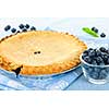 Whole baked blueberry pie with fresh  blueberries