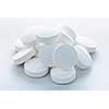 Calcium supplement pills in a pile closeup