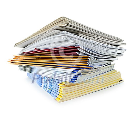Printed paper publications stacked in a pile isolated on white Printed paper publications stacked in a pile isolated on white