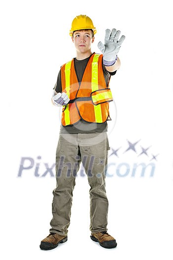 Male construction worker directing with hand signals in vest and hard hat