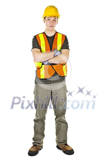 Serious male construction worker in safety vest and hard hat Serious male construction worker in safety vest and hard hat