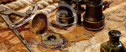 Old vintage retro compass and binoculars on ancient world map. Vintage still life. Travel geography navigation concept background. Old vintage retro compass and binoculars on ancient world map. Vintage still life. Travel geography navigation concept background.