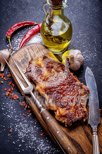 Meat Ribeye steak entrecote close-up on cutting board Meat Ribeye steak entrecote close-up on cutting board