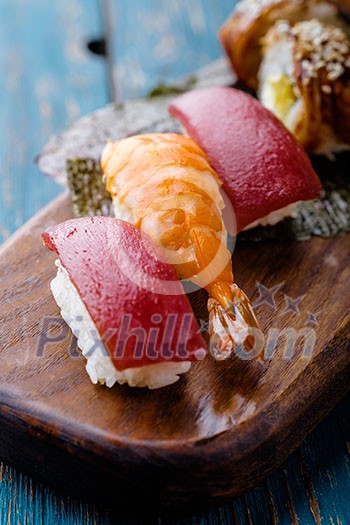 Sushi set on a wooden tray Sushi set on a wooden tray