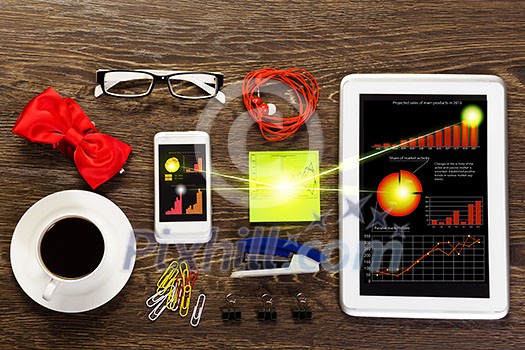 Office workplace with tablet cup mobile phone and stationary Office workplace with tablet cup mobile phone and stationary
