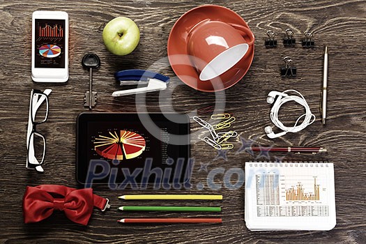 Office workplace with tablet cup mobile phone and stationary Office workplace with tablet cup mobile phone and stationary