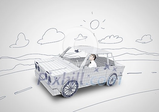 Young man driving car made of sheet of paper Young man driving car made of sheet of paper