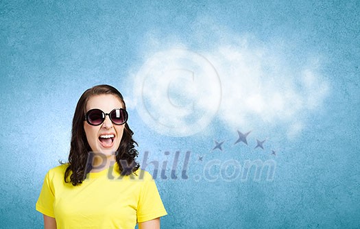 Young girl teenager in sunglasses and yellow shirt Young girl teenager in sunglasses and yellow shirt