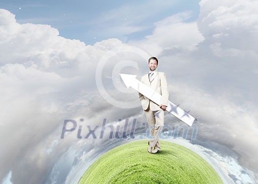 Businessman in suit with white blank arrow in hands Businessman in suit with white blank arrow in hands