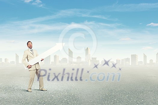 Businessman in suit with white blank arrow in hands Businessman in suit with white blank arrow in hands