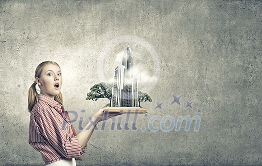 Young funny girl with opened book in hands Young funny girl with opened book in hands