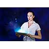 Young pretty surprised woman using tablet pc