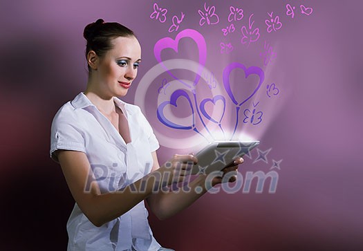 Young pretty surprised woman using tablet pc Young pretty surprised woman using tablet pc