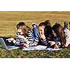 group of teen girl woman outdoor have fun and study homework on laptop computer