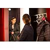 Young woman shopping in a fashion store (color toned image; shallow DOF)