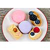 Dessert plate with french macarons and pastries