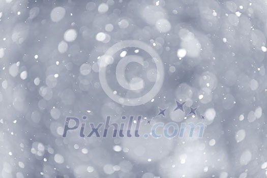 Background of snow flurry falling in winter with some motion blur Background of snow flurry falling in winter with some motion blur