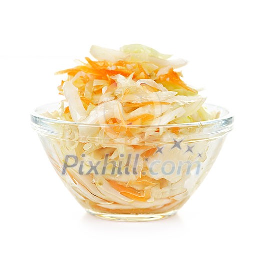 Coleslaw in glass bowl on white background Coleslaw in glass bowl on white background