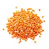 Heap of raw red lentils isolated on white background