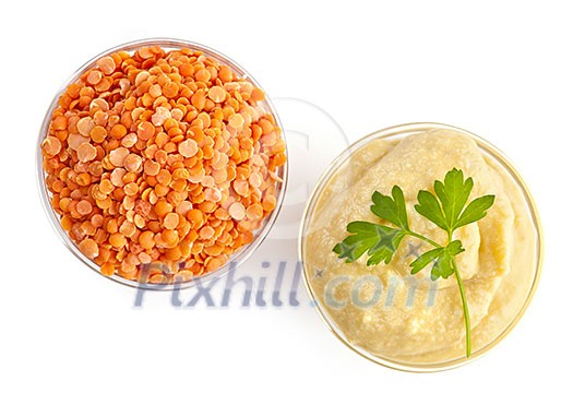 Red lentils and lentil hummus in bowls from above Red lentils and lentil hummus in bowls from above