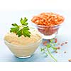 Red lentils and lentil hummus in bowls