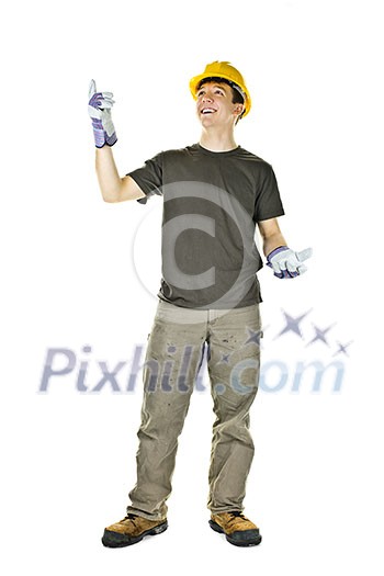 Smiling construction worker pointing up standing isolated on white background