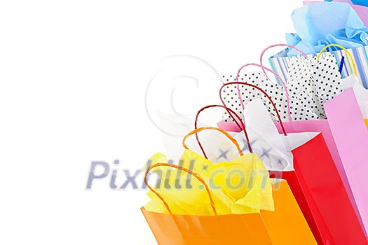 Many colorful shopping bags on white background Many colorful shopping bags on white background