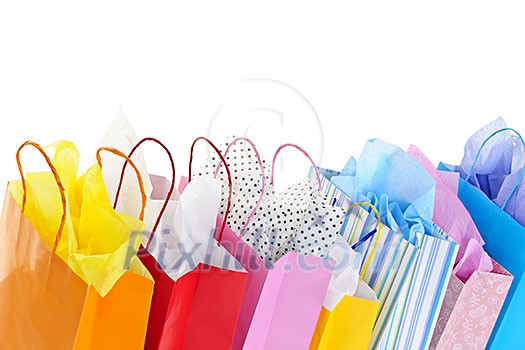 Many colorful shopping bags on white background Many colorful shopping bags on white background