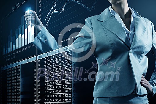 Close view of businesswoman drawing on screen market infographs Close view of businesswoman drawing on screen market infographs