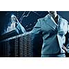 Close view of businesswoman drawing on screen market infographs