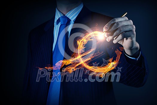 Close view of businessman drawing on screen burning euro sign Close view of businessman drawing on screen burning euro sign
