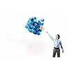 Businessman reaching hand to touch digital cube figure