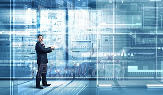 Businessman on digital futuristic background using his tablet pc Businessman on digital futuristic background using his tablet pc