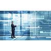 Businessman on digital futuristic background using his tablet pc
