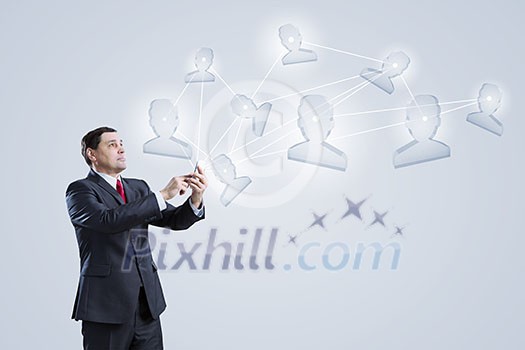 Businessman using his smartphone on background of connection lines Businessman using his smartphone on background of connection lines